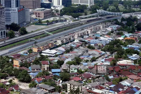 An overhead drone shot of a lower-income neighbourhood in malaysia as an idea of property valuation in malaysia.