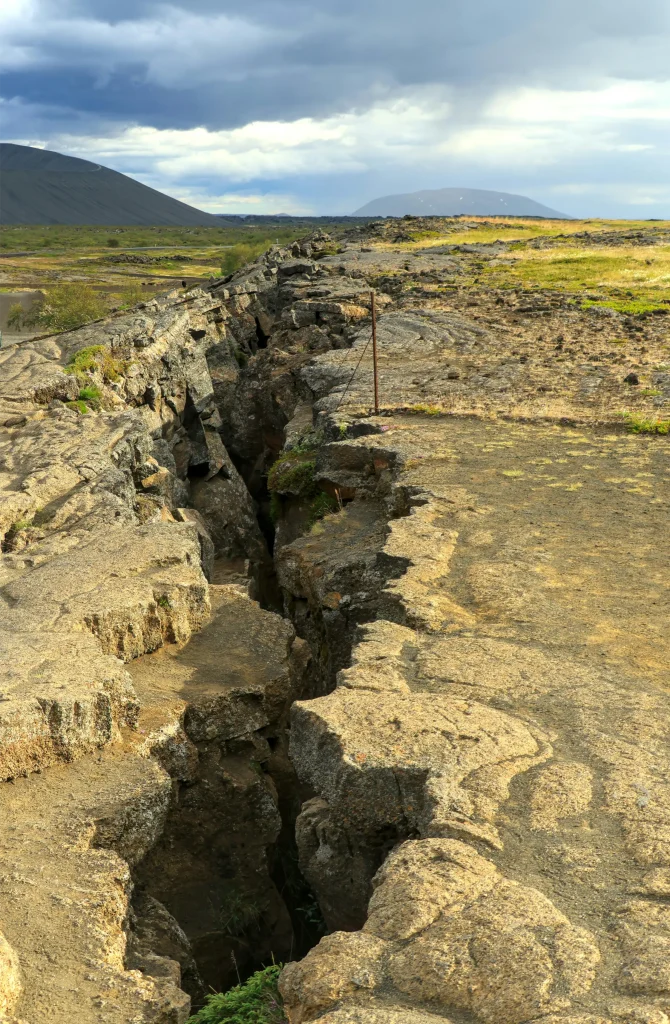 A fault line on a ground in a barren landscape.